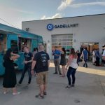 Employees having a company party with food trucks at Gadellnet IT Solutions in St. Louis