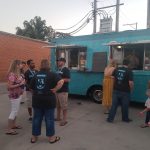 Employees having a company party with food trucks at Gadellnet IT Solutions in St. Louis, MO