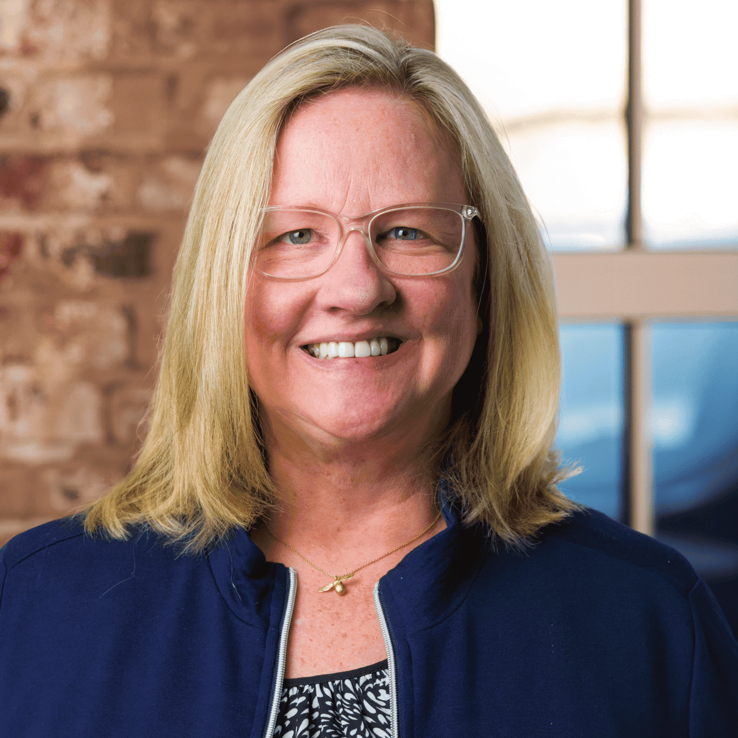 Headshot of Maggie Brackett